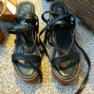 Worn once. Wrap up platforms.